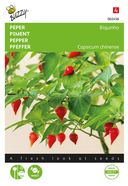 Pepper Biquinho -fröpåsens framsida med kyynelmäisiä röda chilejä.